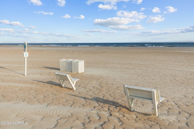 view of water feature with a beach view