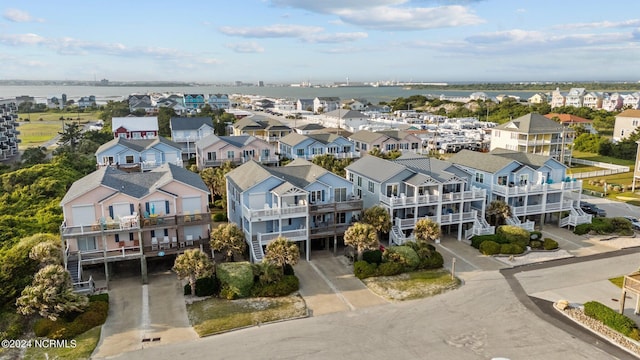 drone / aerial view with a water view