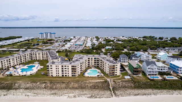 bird's eye view with a water view