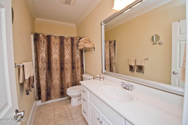 bathroom featuring crown molding, vanity, toilet, and tile patterned flooring