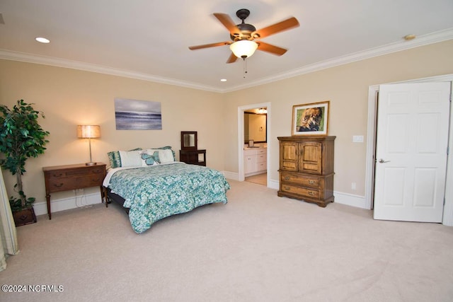 bedroom featuring light carpet, crown molding, ceiling fan, and ensuite bathroom