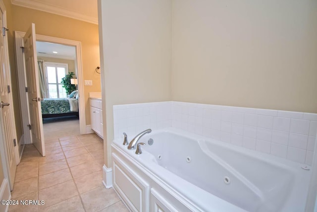 bathroom featuring crown molding, a tub to relax in, and tile patterned floors