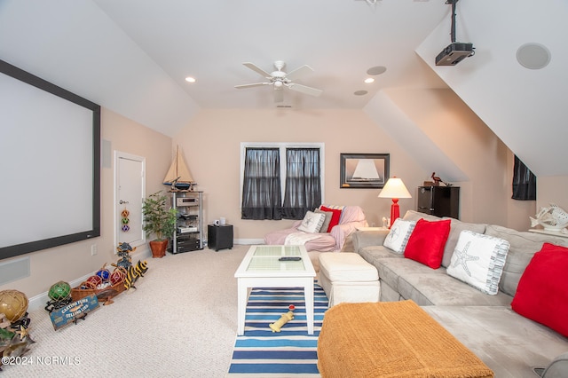 home theater with lofted ceiling, carpet floors, and ceiling fan