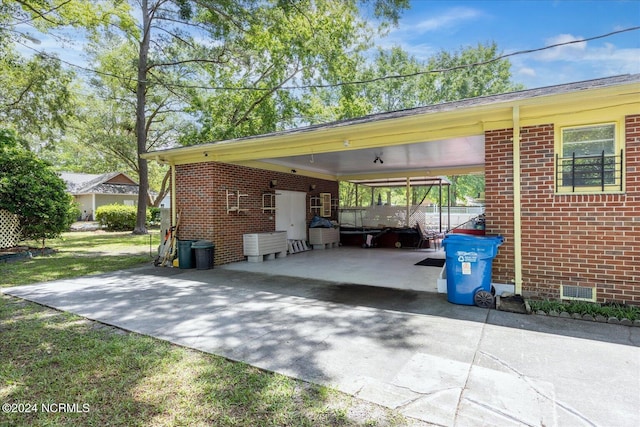 exterior space featuring a carport