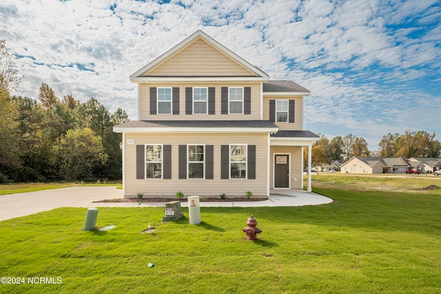 view of front of home with a front yard