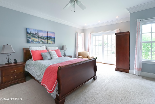 bedroom featuring ornamental molding, carpet, multiple windows, and ceiling fan