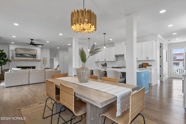 dining room with light wood-type flooring and ceiling fan