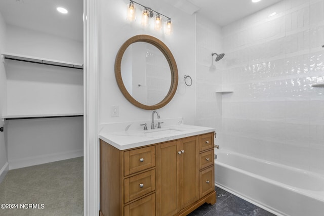 bathroom with vanity and  shower combination