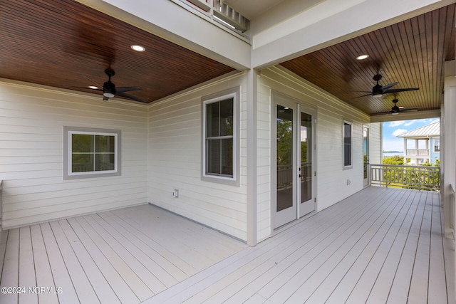 wooden deck with french doors and ceiling fan