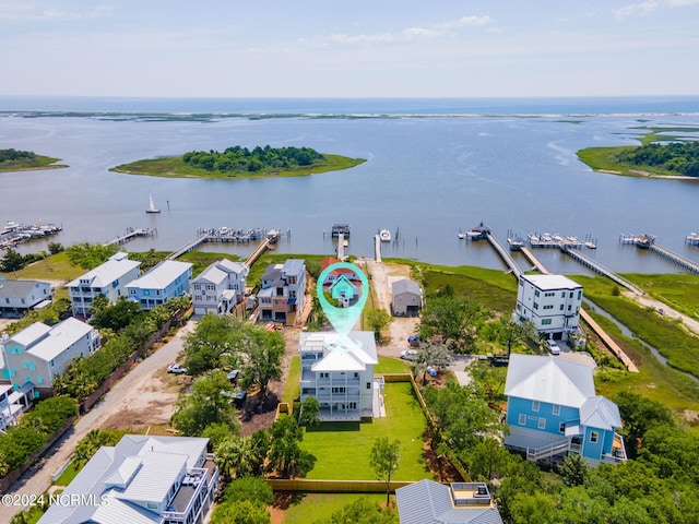 bird's eye view with a water view