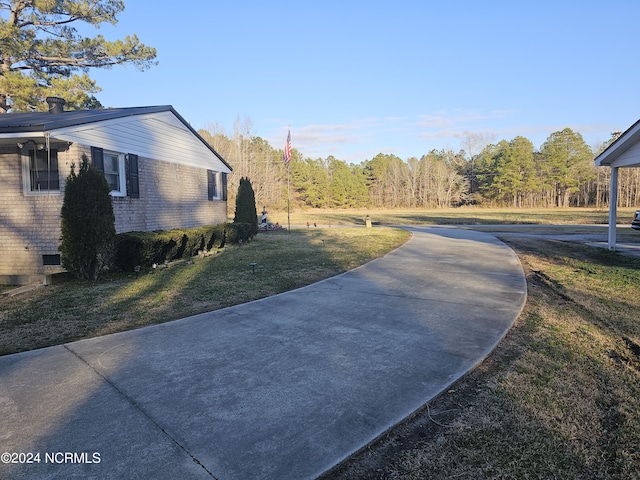 view of home's exterior featuring a yard