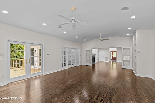 unfurnished living room featuring french doors, dark hardwood / wood-style floors, ceiling fan, and lofted ceiling