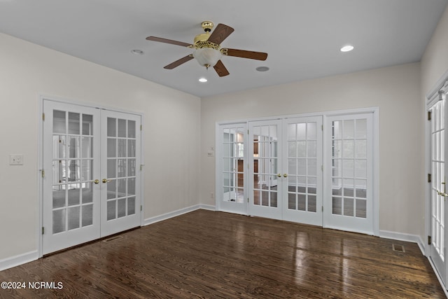 unfurnished room featuring french doors and dark hardwood / wood-style floors