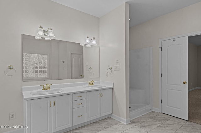 bathroom with vanity and a shower