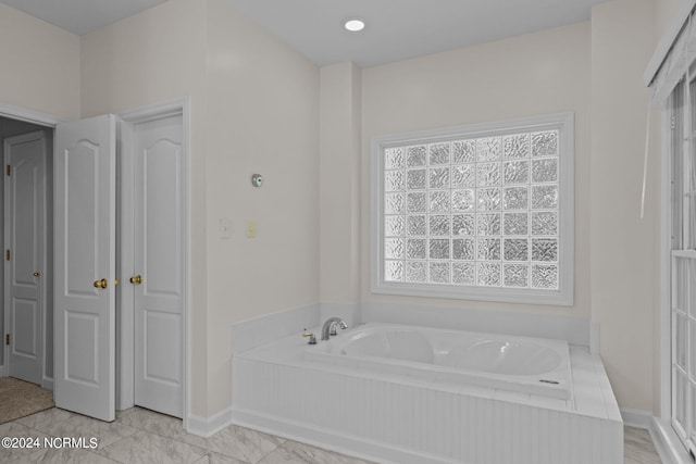 bathroom with a bath