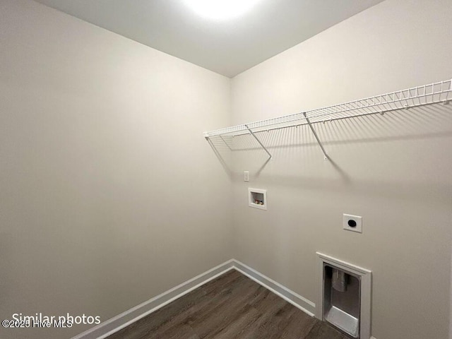 laundry area with washer hookup, dark hardwood / wood-style flooring, and electric dryer hookup