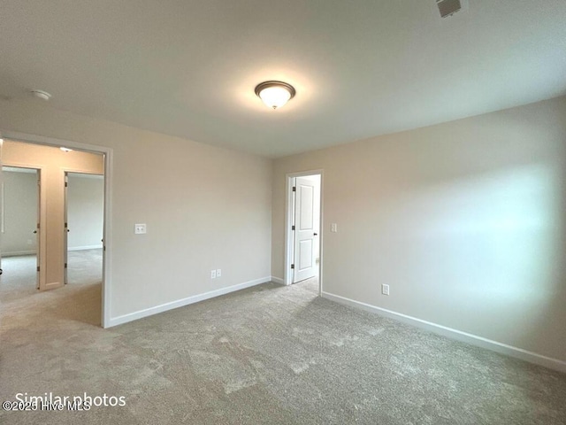 empty room with light carpet