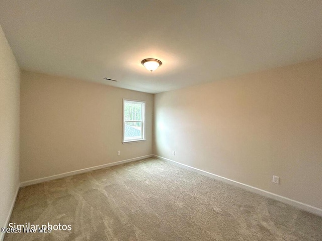 empty room with carpet floors