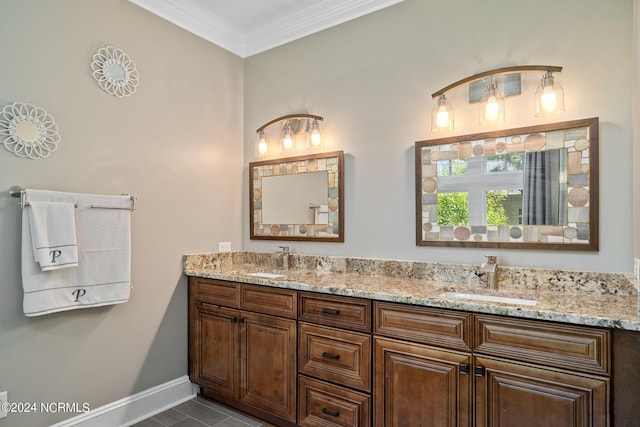 bathroom with tile patterned floors, vanity, and crown molding