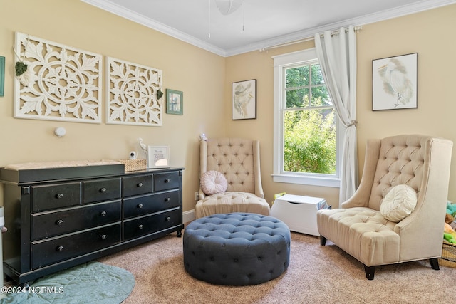 sitting room with crown molding and light carpet