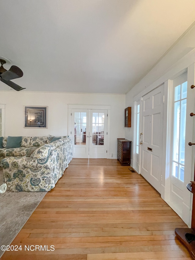 entrance foyer featuring french doors and light wood-type flooring