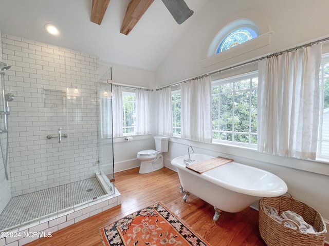 bathroom featuring shower with separate bathtub, wood-type flooring, toilet, and lofted ceiling