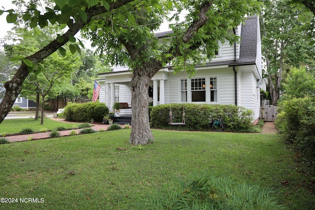 view of front of property with a front lawn