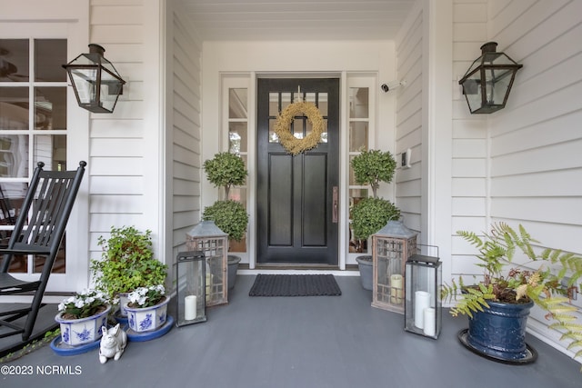 entrance to property with covered porch