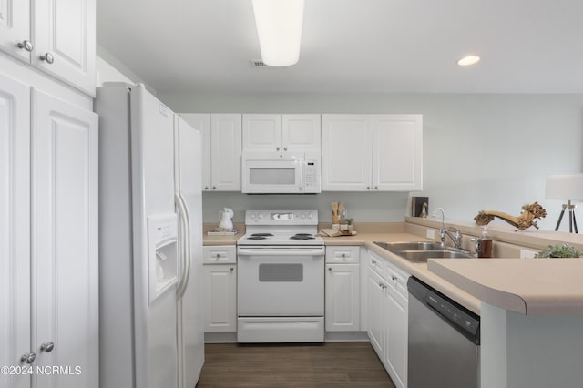 kitchen featuring white appliances, white cabinets, a sink, and light countertops