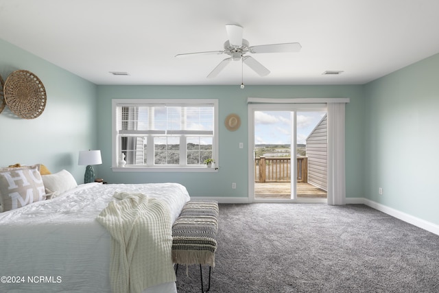 bedroom with baseboards, access to outside, visible vents, and carpet flooring