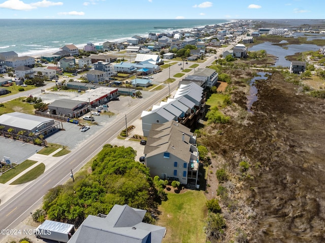 birds eye view of property featuring a residential view and a water view