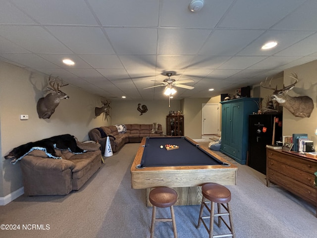 recreation room with carpet floors, ceiling fan, a drop ceiling, and pool table