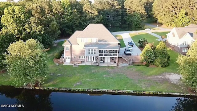 drone / aerial view featuring a water view