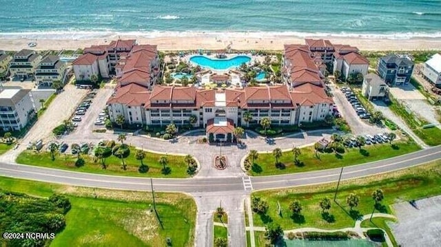 aerial view with a beach view and a water view