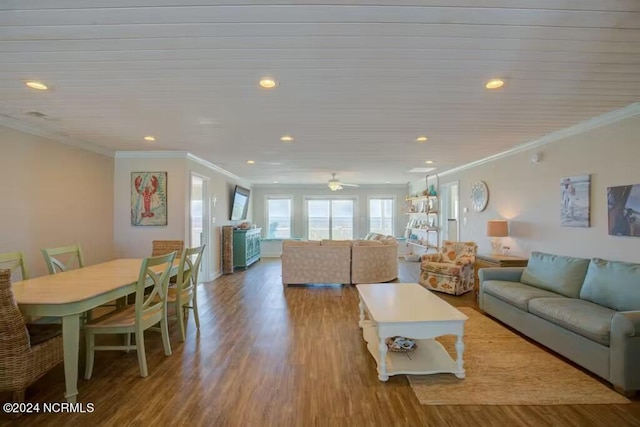 living room with crown molding, ceiling fan, and hardwood / wood-style floors