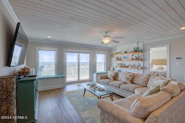 living room with hardwood / wood-style floors, ceiling fan, wood ceiling, and crown molding