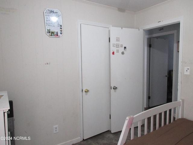 bedroom with crown molding