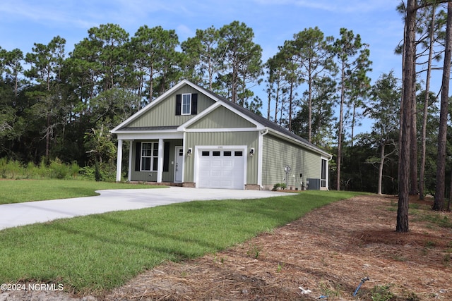 view of front facade with a garage and a front lawn