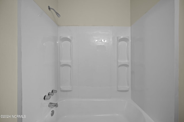 bathroom with shower / bathtub combination