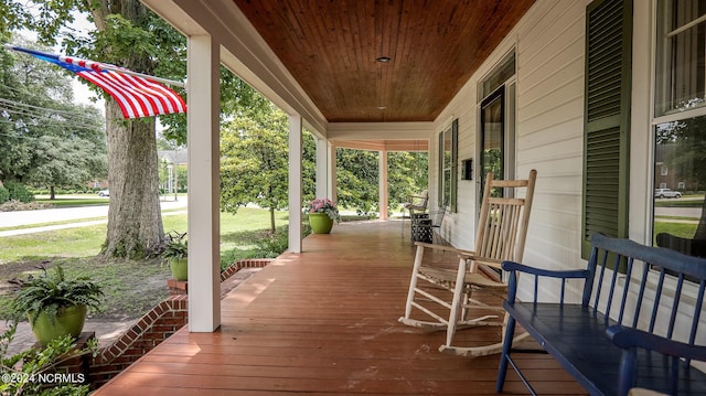 wooden deck with covered porch