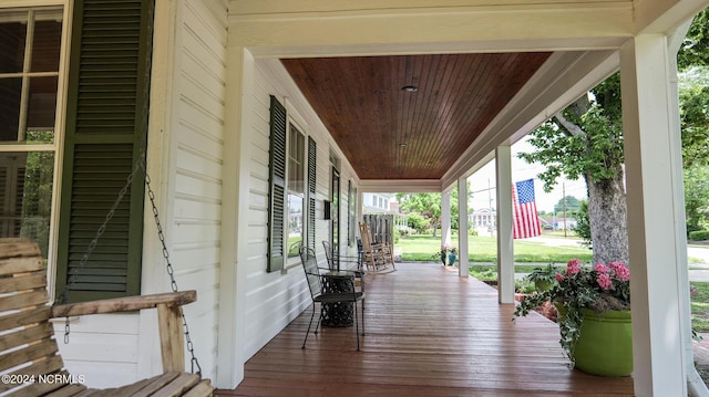 wooden terrace with covered porch