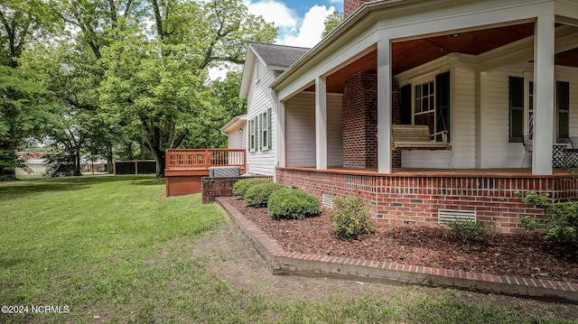 view of home's exterior with a yard