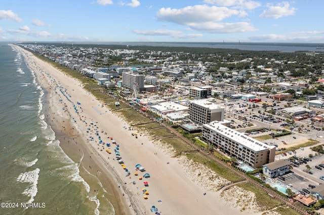 bird's eye view with a view of the beach and a water view