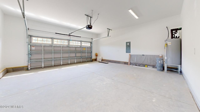 garage with electric panel, a garage door opener, and water heater