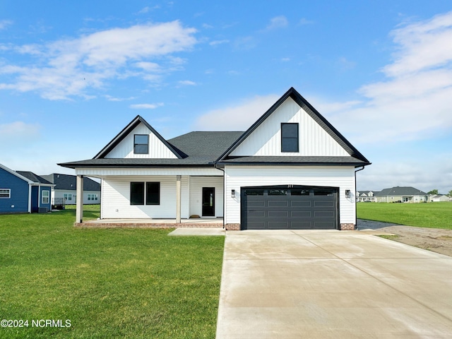 modern farmhouse style home featuring a shingled roof, concrete driveway, an attached garage, covered porch, and a front lawn