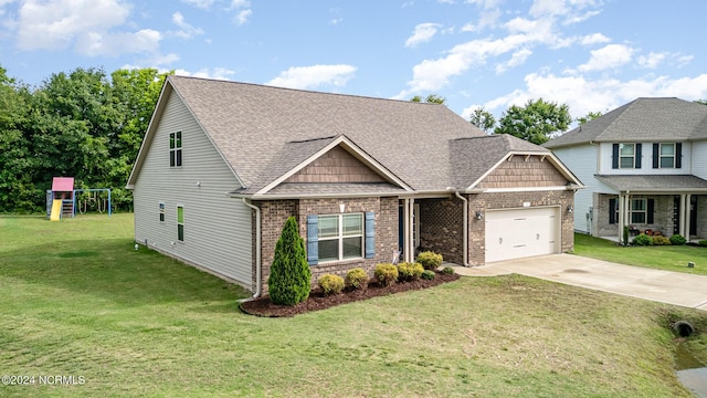 view of front of house with a garage, driveway, a front yard, and brick siding