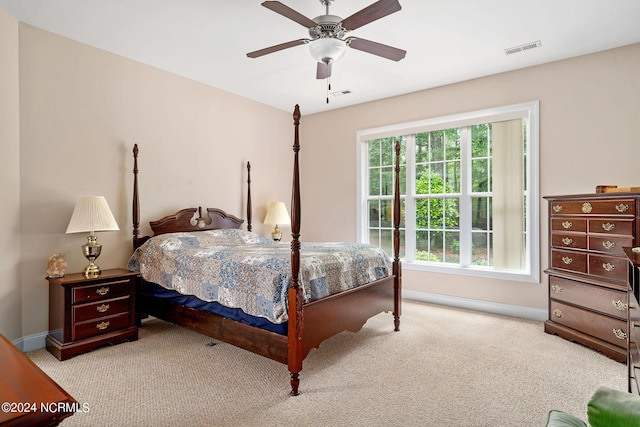 227 October Glory Dr, Wallace, NC 28466 - carpeted bedroom featuring baseboards and ceiling fan