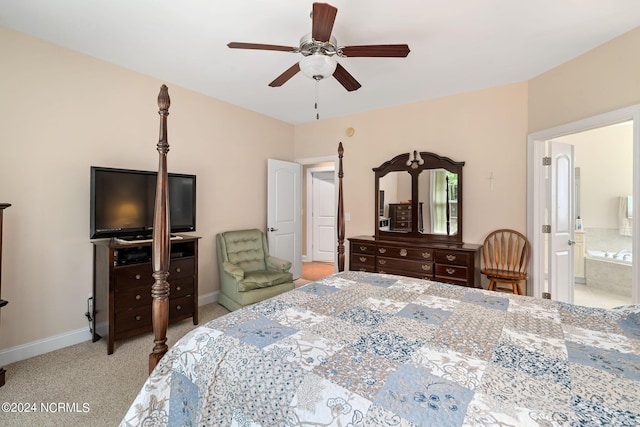 227 October Glory Dr, Wallace, NC 28466 - carpeted bedroom with baseboards, a ceiling fan, and connected bathroom