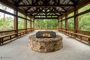 view of patio / terrace featuring a gazebo and an outdoor fire pit