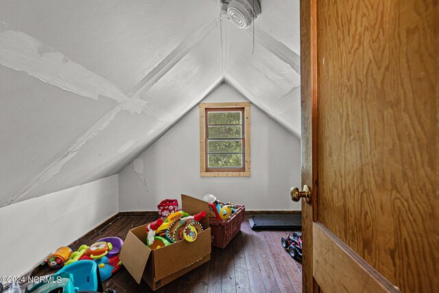 game room with hardwood / wood-style floors and lofted ceiling